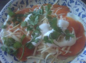 Una foto de Huevos entomatados