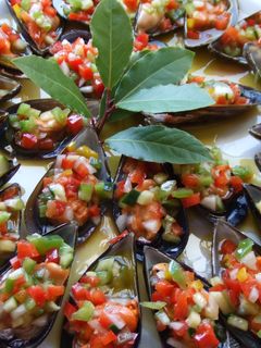 Una foto de Tapa de mejillones con vinagreta de frambuesa