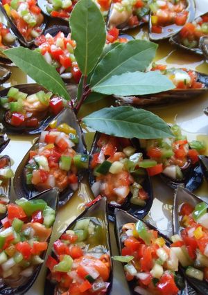 Una foto de Tapa de mejillones con vinagreta de frambuesa