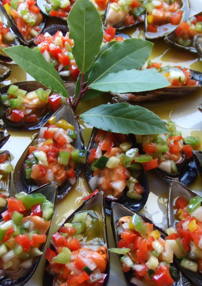 Una foto de Tapa de mejillones con vinagreta de frambuesa