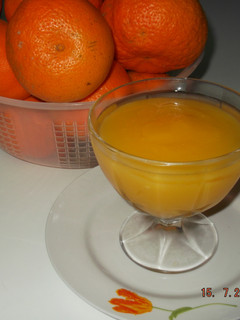 Una foto de Crema de naranjas en almíbar