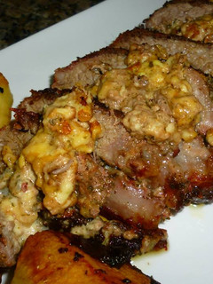 Una foto de Colita de cuadril rellena al horno con papas