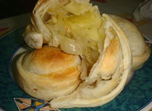 Una foto de Empanadas de cebolla y mozzarella