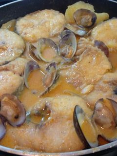 Una foto de Merluza con salsa romesco