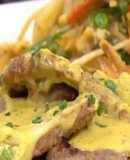 Escalopes a la mostaza con revuelto gramajo