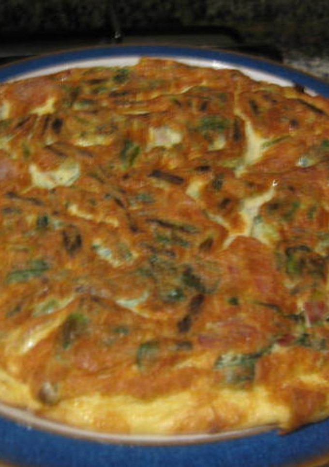 Una foto de Tortilla de espinacas con jamón