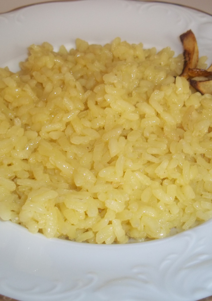 Una foto de Arroz blanco de cocido con piel de limón