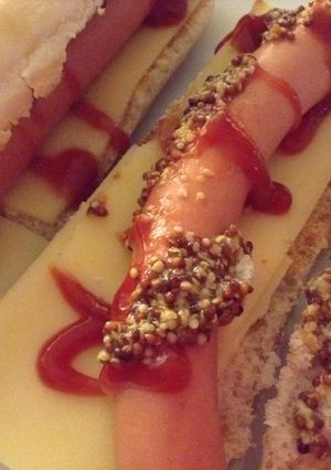 Una foto de Hotdog con queso