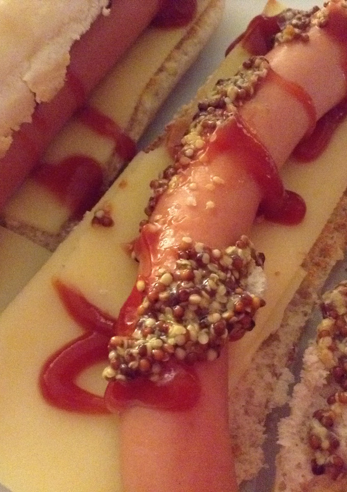 Una foto de Hotdog con queso