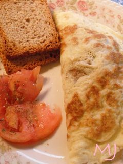 Una foto de Omelette de champiñones y cebolla