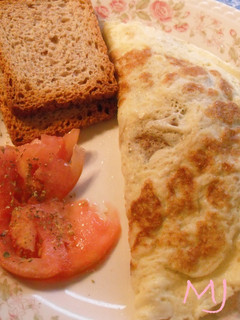 Una foto de Omelette de champiñones y cebolla
