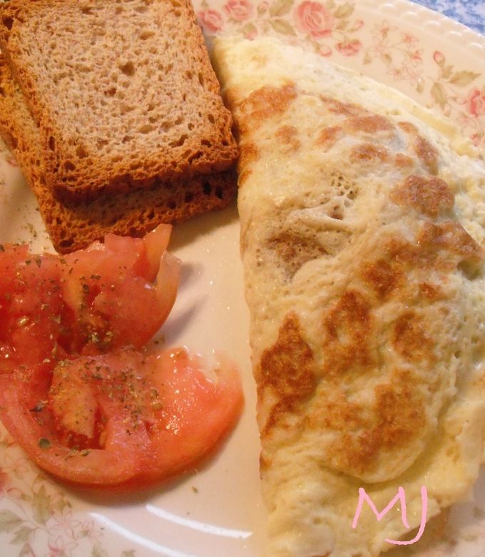 Una foto de Omelette de champiñones y cebolla