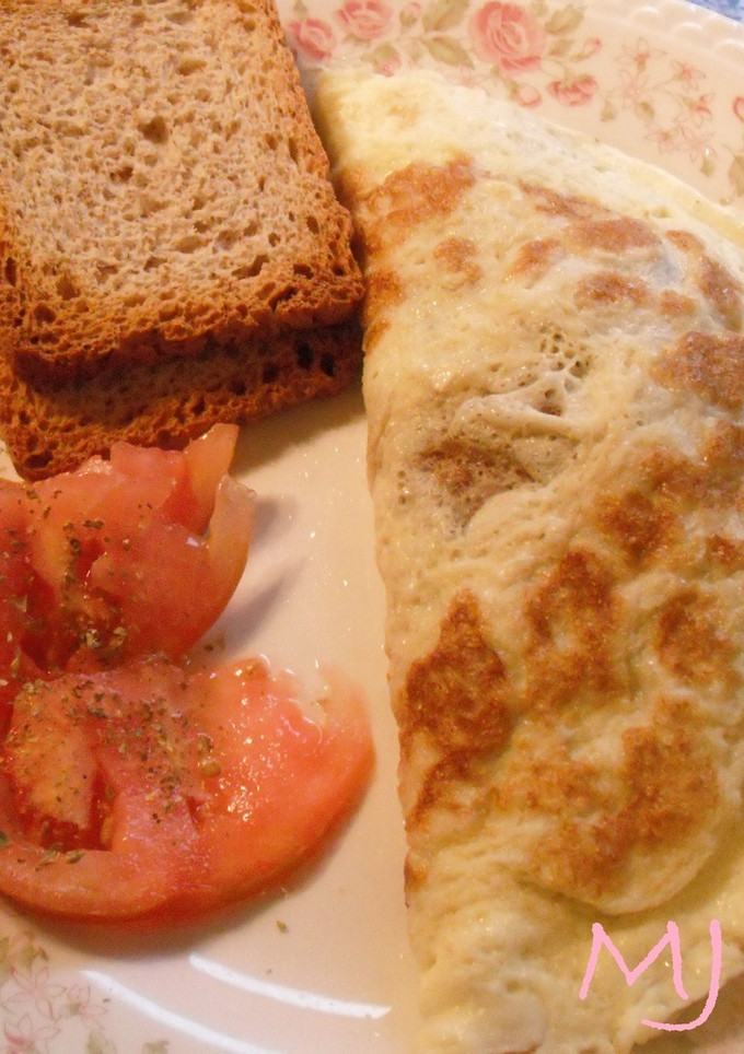 Una foto de Omelette de champiñones y cebolla