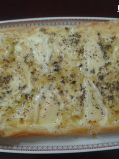 Una foto de Tarta de calabacín con queso provolone al orégano