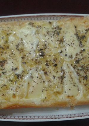 Una foto de Tarta de calabacín con queso provolone al orégano