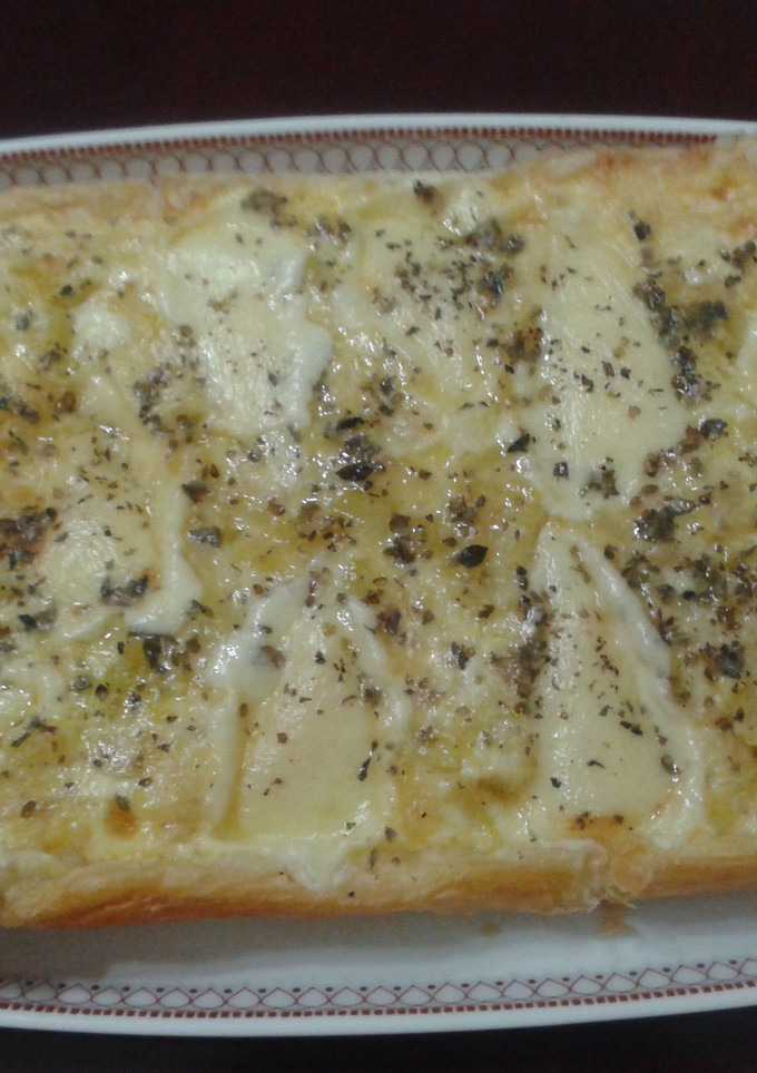Una foto de Tarta de calabacín con queso provolone al orégano