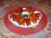 Una foto de pollo en salsa barbacoa