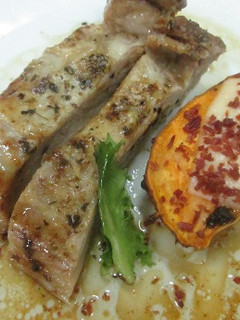 Una foto de Secreto de cerdo con batatas exquisitas al horno