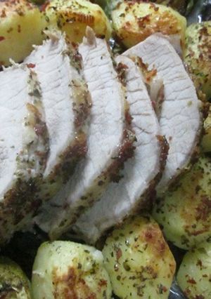Una foto de Lomo de cerdo y patatas a la sal de jamón