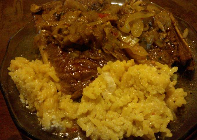 Foto principal de Paleta de chancho con criolla caliente y arroz