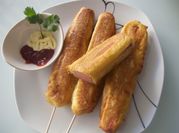 Una foto de banderillas de hot cakes