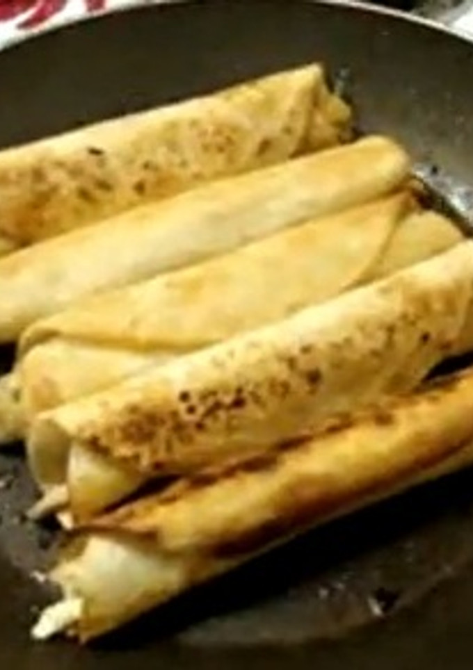 Una foto de Tacos dorados