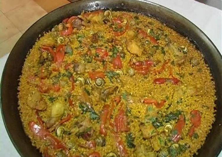 🇪🇸 Paella de arroz con conejo y caracoles 🇪🇸
