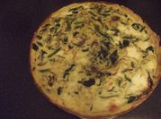 Una foto de quiche espinaca y queso