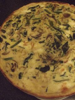 Una foto de Quiche de espinaca y cebolla