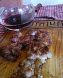 Asado a la parrilla de mollejas de cogote al limón y vino 