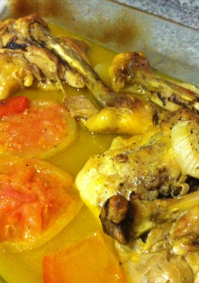 Una foto de Pollo asado con vino blanco