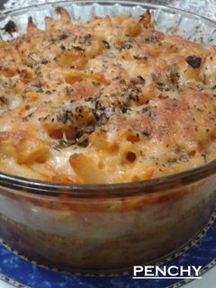 Una foto de Pastel de macarrones con queso cheddar al orégano