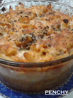 Una foto de Pastel de macarrones con queso cheddar al orégano