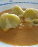 Galets rellenos de bacalao con crema de marisco