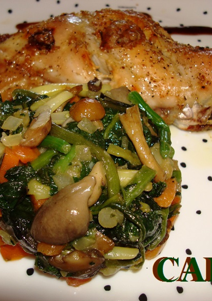 Una foto de Conejo asado con timbal de verduras