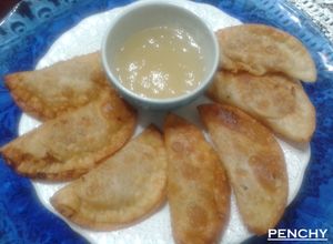 Una foto de Empanadillas de foie de pato trufado con mermelada de cava