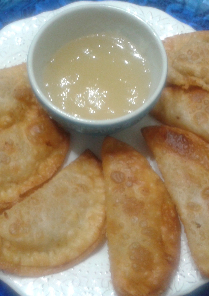 Una foto de Empanadillas de foie de pato trufado con mermelada de cava