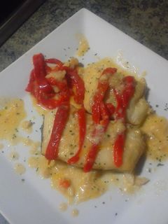 Una foto de Bacalao al pil pil con pimientos