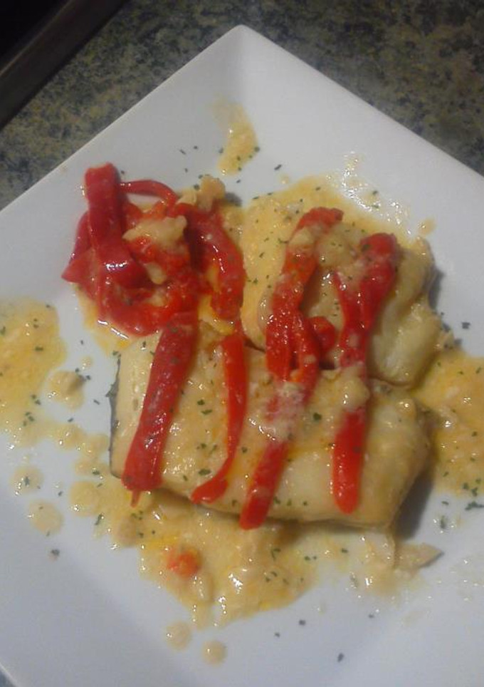 Una foto de Bacalao al pil pil con pimientos