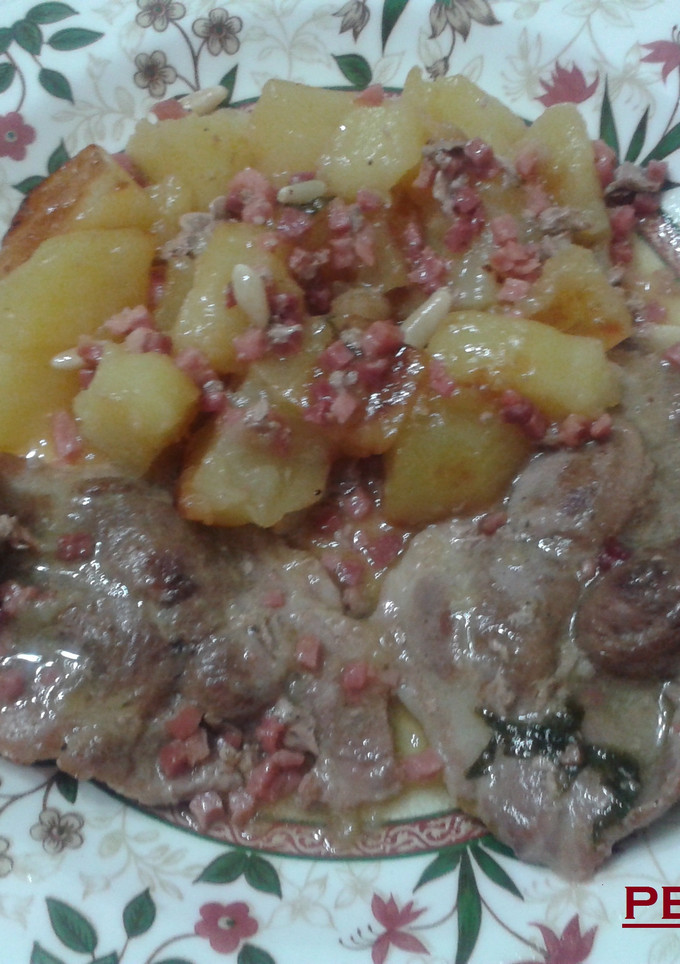 Una foto de Chuletas de cerdo con vino semi dulce de Cartagena
