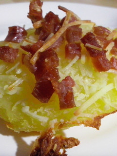 Una foto de Patatas al horno gratinadas con jamón