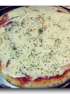 Una foto de Pizza integral