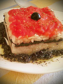 Una foto de Tartar de esqueixada con bacalao y olivada