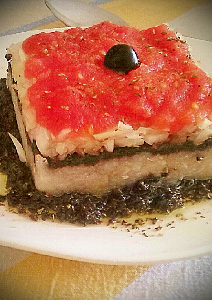 Una foto de Tartar de esqueixada con bacalao y olivada