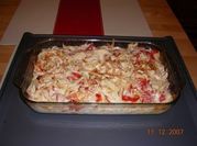 Una foto de pastel de pollo a la poblano