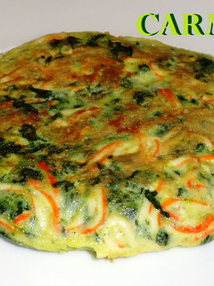 Una foto de Tortilla de espinacas y rallado de mar