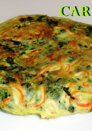 Una foto de Tortilla de espinacas y rallado de mar