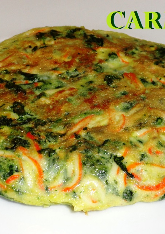 Una foto de Tortilla de espinacas y rallado de mar
