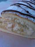 Brazo de gitano relleno de nata, dulce de leche y manzana