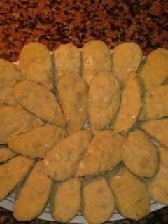 Una foto de Mejillones rellenos de bechamel